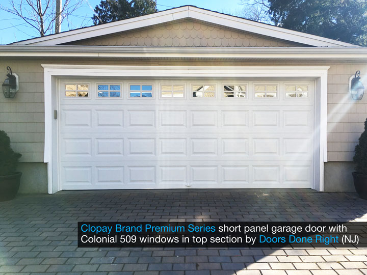 Clopay Premium Series model 9200 steel raised panel garage door - short panel with Colonial 509 windows front view