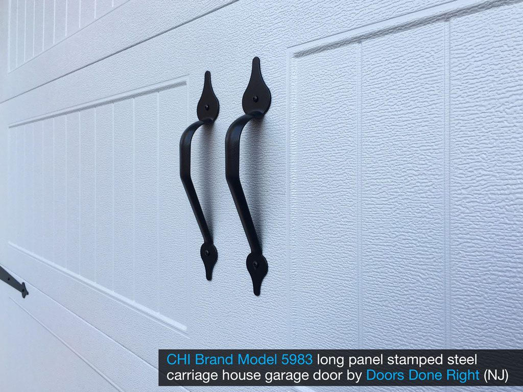 chi brand model 5983 stamped steel garage door with stockton windows - handle closeup