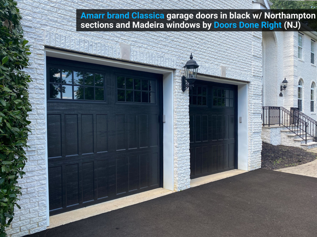 Amarr brand Classica garage doors in black w/ Northampton sections and Madeira windows full house view