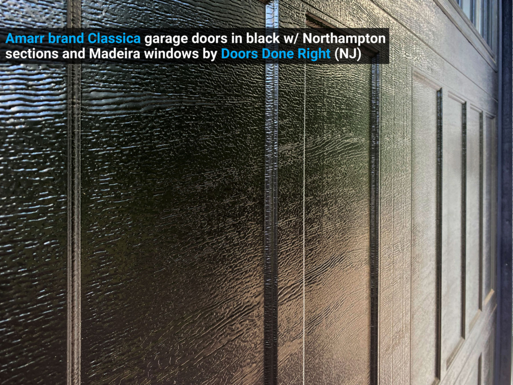 Amarr brand Classica garage doors in black w/ Northampton sections and Madeira windows extra closeup