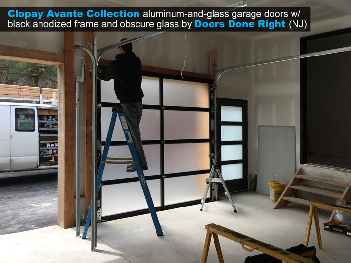 8 ft x 8 ft Clopay Avante aluminum and glass garage door with black anodized frame and obscure glass