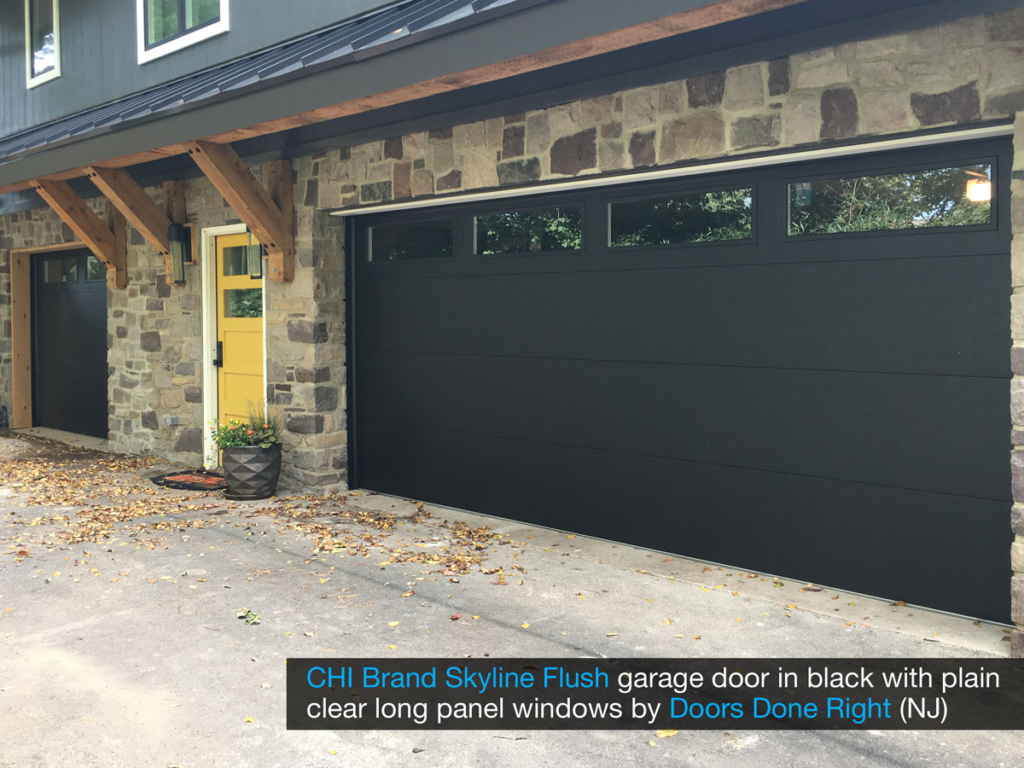 chi model 2284 skyline flush garage door in black with clear long panel windows in top door section - other view