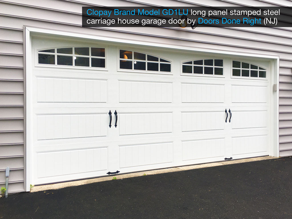 clopay brand stamped steel carriage house garage door model gd1lu with arch1 with grilles windows