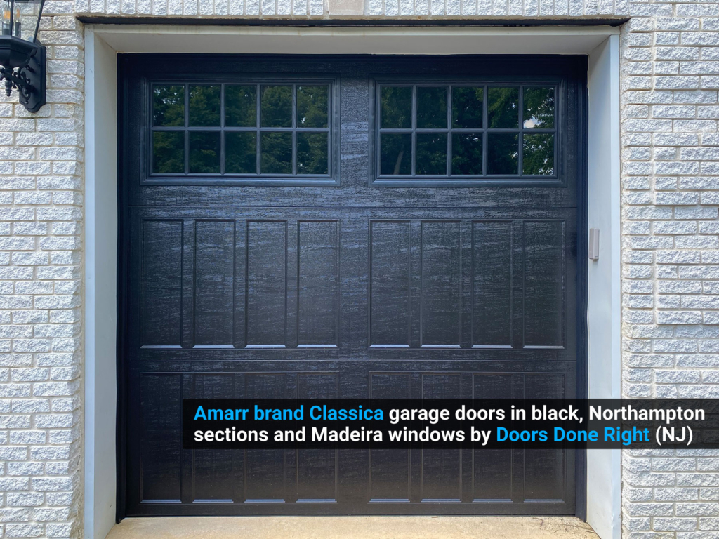 Amarr brand Classica garage doors in black w/ Northampton sections and Madeira windows single door view
